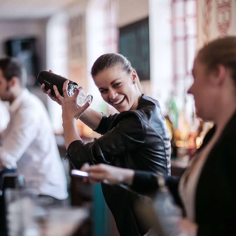 Why Do Bartenders Smile When Shaking?